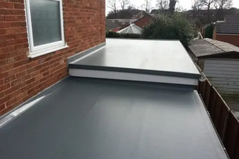 How to Clean Rubber Roof for Repair