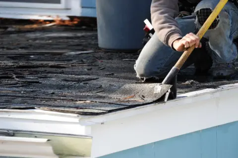 How to Repair Shingles on a Steep Roof